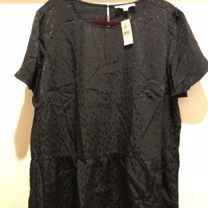 Black Peplum Blouse with short sleeves.